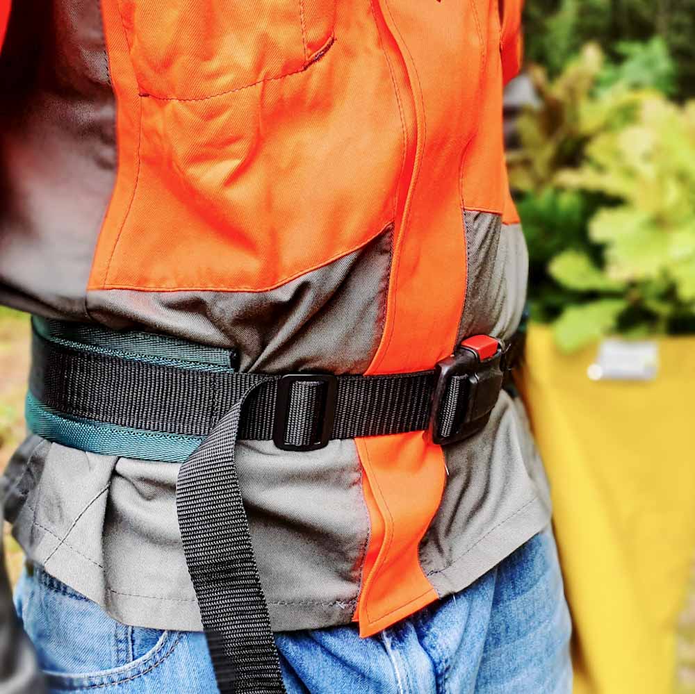 Man wearing PLANTEM tree planters bag in woodland